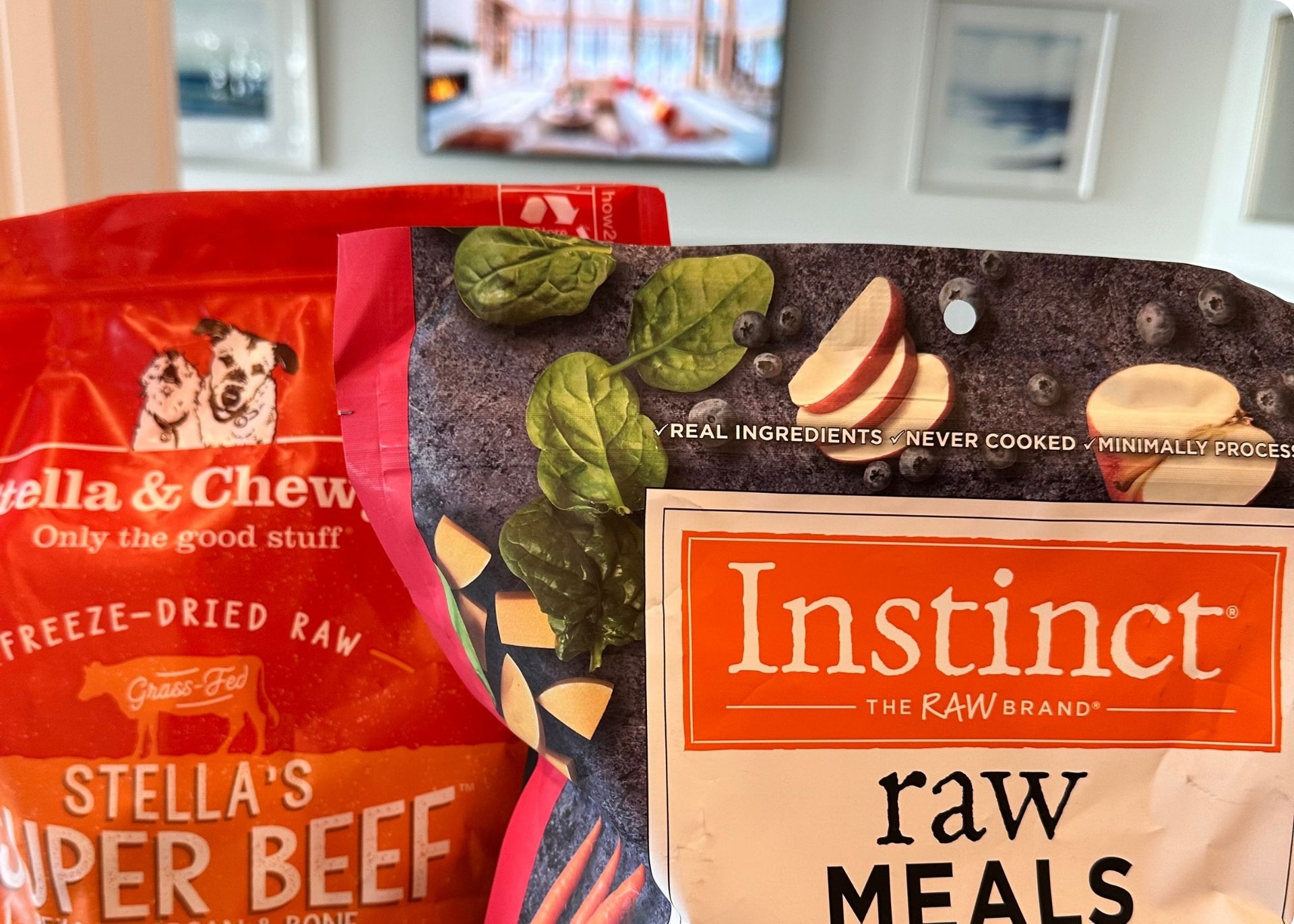 Photo of the top halves of two freeze-dried dog food brands: Stella & Chewy's and Instint