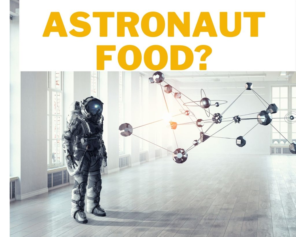 Person in Space Suit looking at floating solar system below words 'astronaut food?'